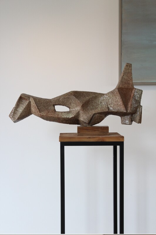 cubist ceramic sculpture representing a reclining figure or maybe a mairmaid by Paul De Bruyne