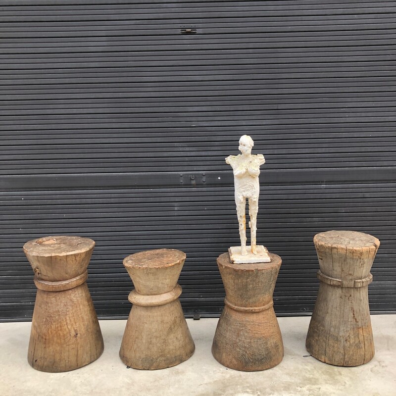 four(4) Zambian wooden stompers , culpted in heavy and dense African wood. 