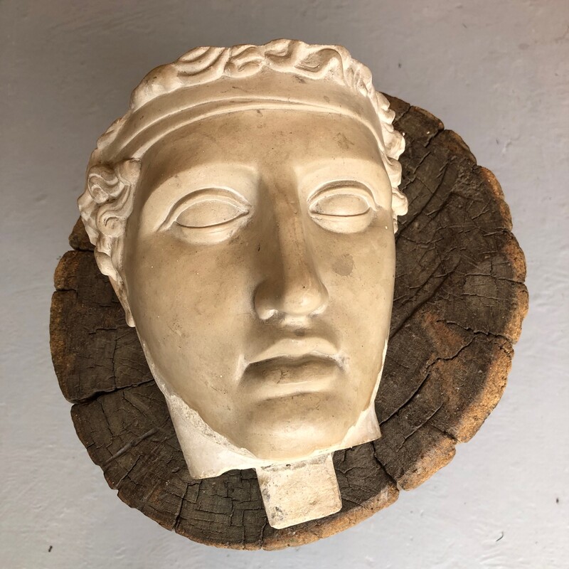 marble head representing Diadumene, an athlete wearing a ribbon around his forehead, the “stefanos”