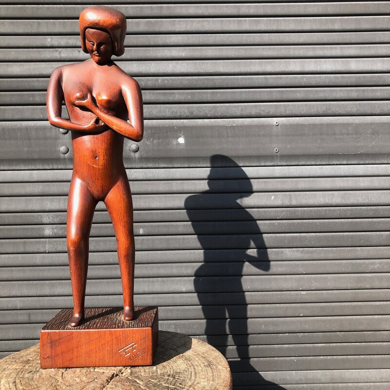 naIve female nude , sculpture made of sherry wood