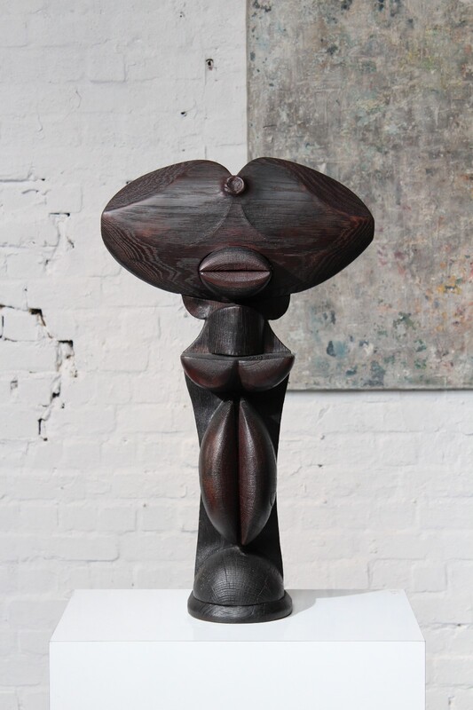Totem sculpture in burnt wood by the Belgian artist Jacky De Maeyer